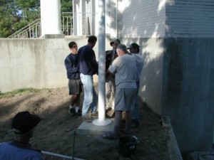 Putting in the flag pole